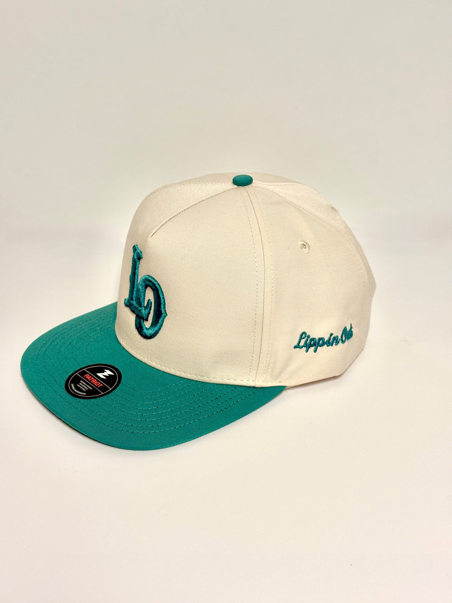 “LO” Masters green snap