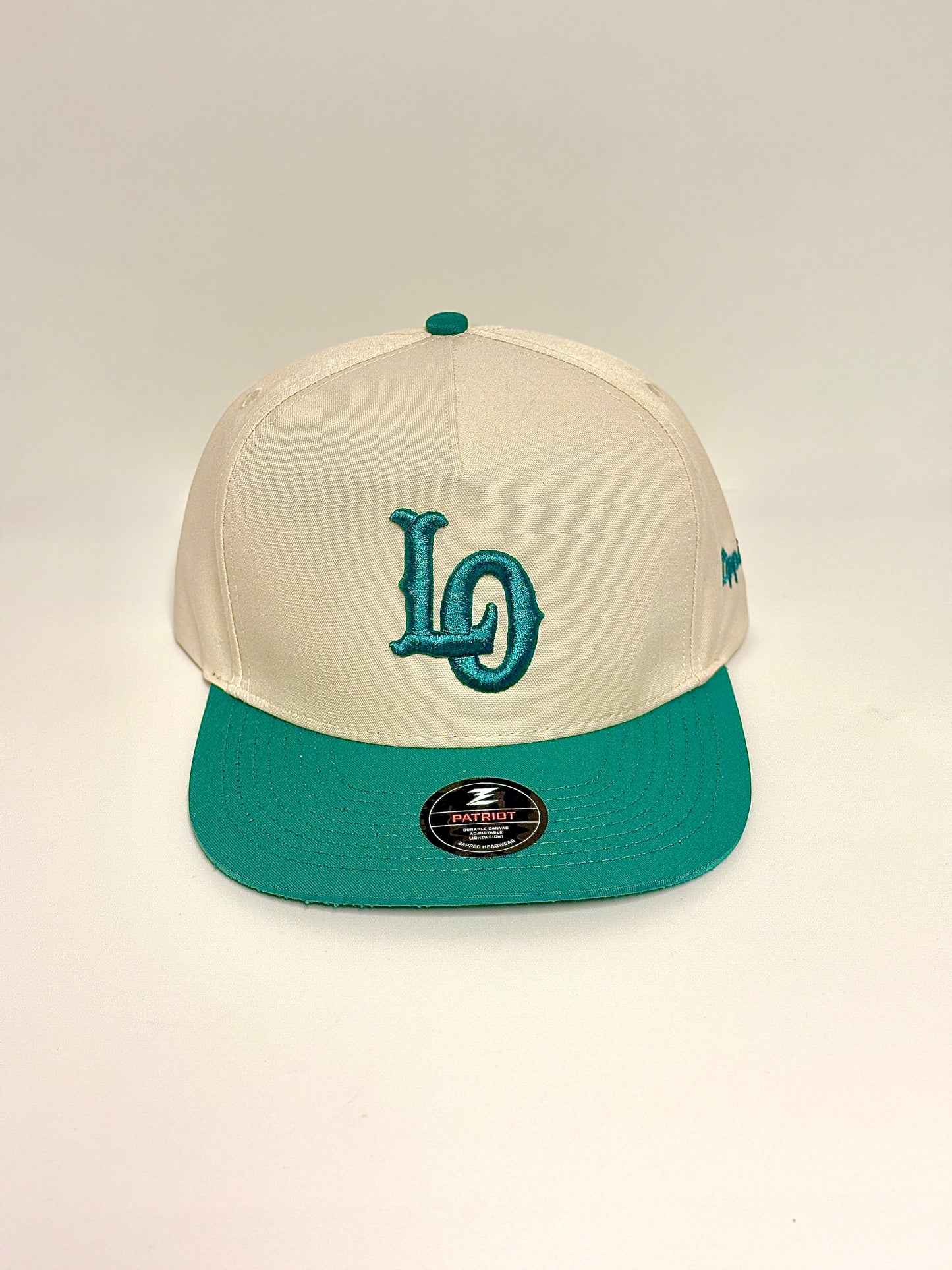 “LO” Masters green snap