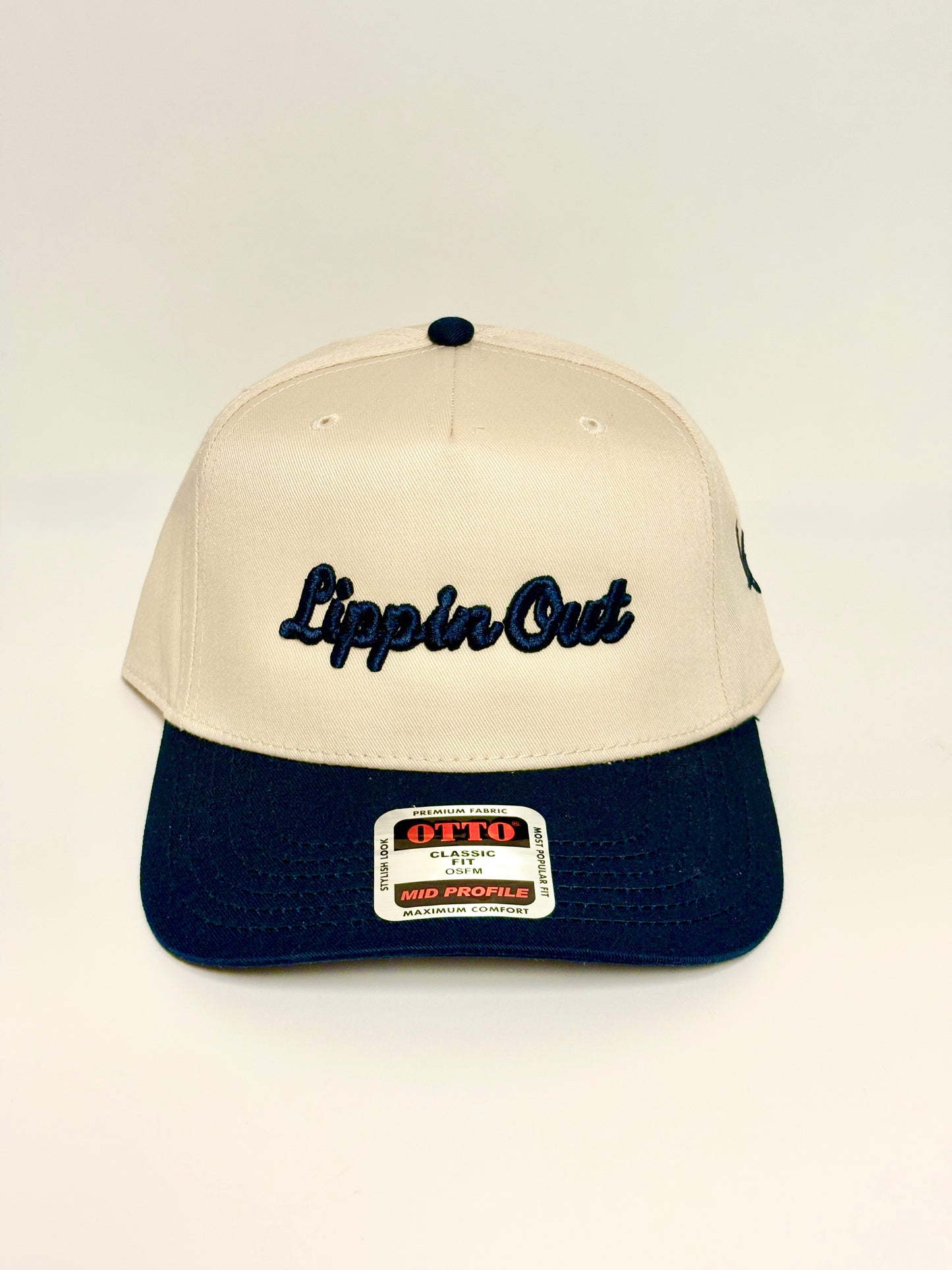 “Lippin Out” Navy and Off White snap.